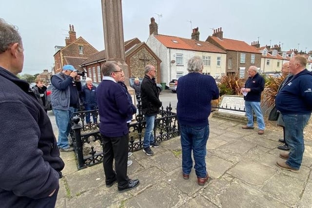 Martin Traves, Flamborough Lifeboat DLA, laid a wreath on behalf of the Flamborough Fishermen's Memorial Group and Councillor Vic Leppington a wreath on behalf of the
Flamborough Parish Council. Photo courtesy of Darren Traves