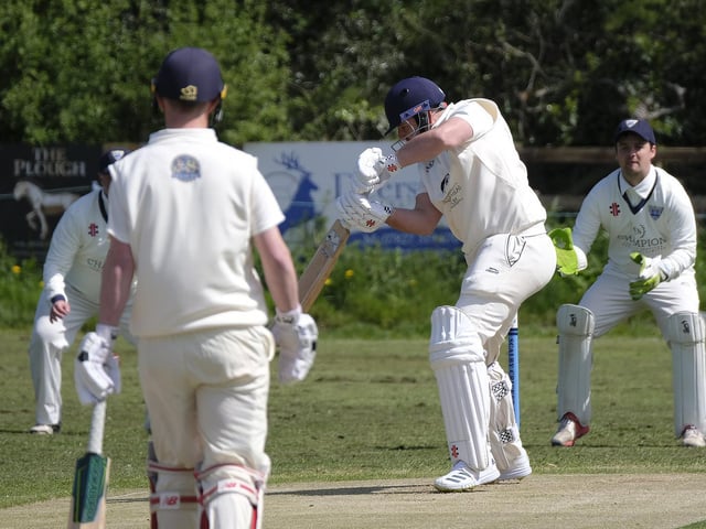 Scalby skipper Brett Cunningham hits the ball into the offside