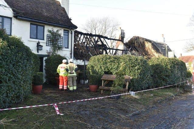 The thatched roof was destroyed in the fire.