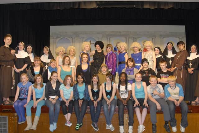This excellent group photograph shows some of the cast and crew of Bridlington School’s production of Sister Act in 2009. Do you recognise any of the people in the picture? Image taken by Paul Atkinson. (Sister Act ps0914-26)