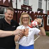 Angela and James Rusden, owners of The Toulson Court Bed and Breakfast, toast their first award win.