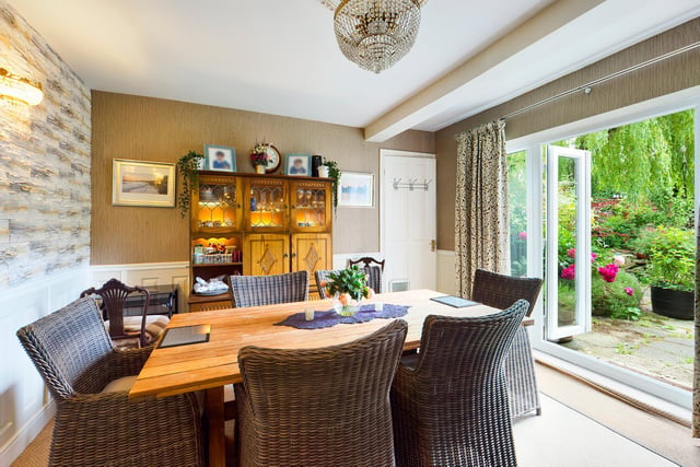 The dining room opens out to a patio and the garden, so ideal for entertaining purposes.