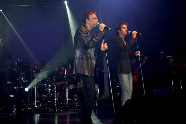 Whitby's Alistair Griffin on stage with Bee Gees legend Robin Gibb.