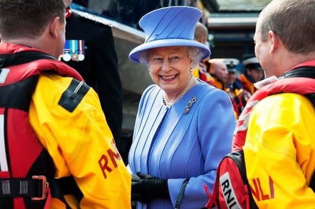 The Queen has been Patron of the RNLI since 1952 and has officially recognised the efforts made by hundreds of RNLI volunteers towards saving lives at sea by awarding them in her twice yearly honours lists. Photo courtesy of RNLI/Nigel Millard