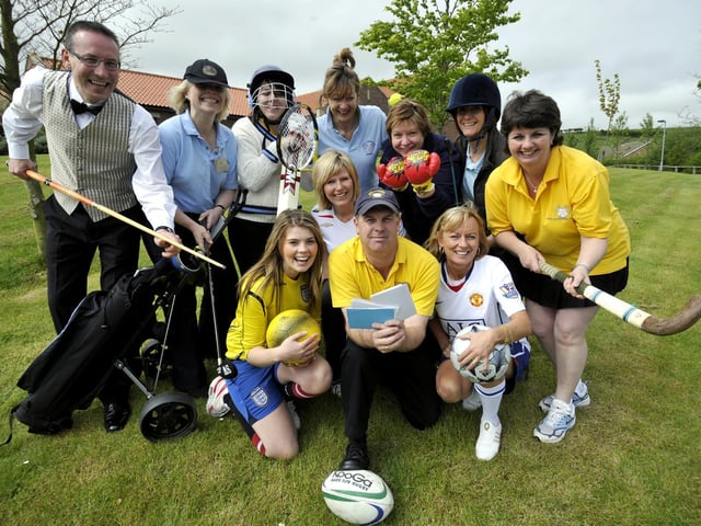 Saint Catherine's Hospice fundraisers look the part for their forthcoming Question of Sport quiz night at the Rugby Club.