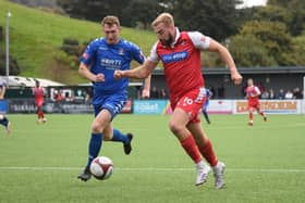 Jake Day, right, in action at home to Witton last season