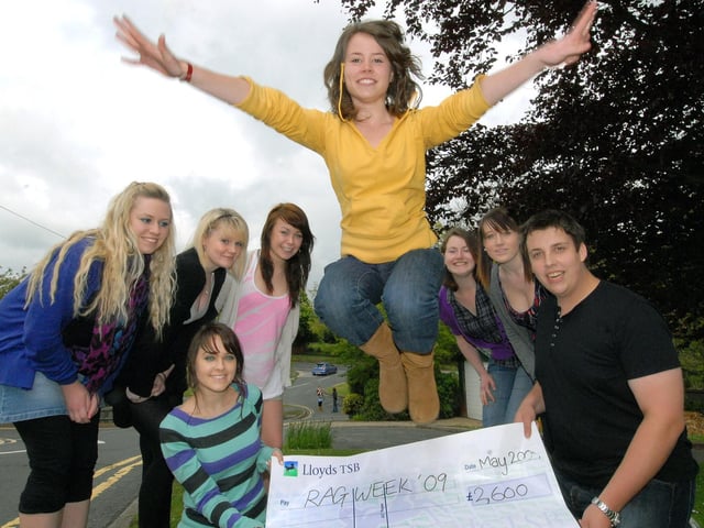 Scarborough 6th Form College Rag Week raises £2,600 for charity. Students cheer as fellow student Emily Finch takes a triumphant leap.
