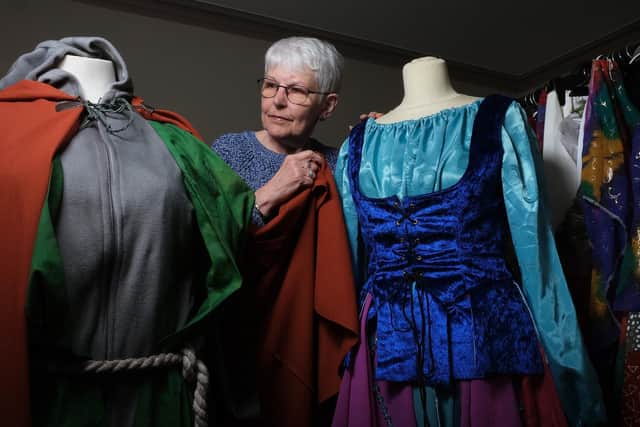 Betty Melbourne with costumes for Esmeralda and Quasimodo for the Scarborough Theatre Company production of the Hunchback of Notre Dame