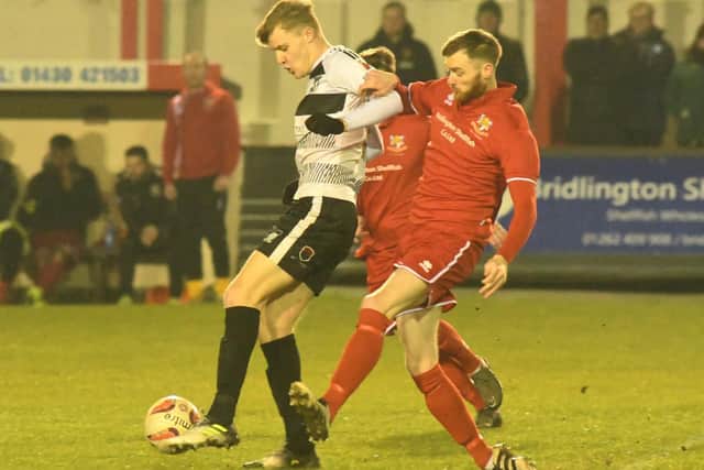 New boss Mike Thompson in action as a Bridlington Town FC player
