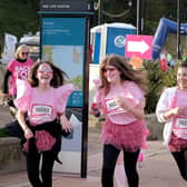 Bright pink runners take to the course in Scarborough.