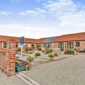This stylish barn conversion is on th market with Reeds Rains priced at £575,000.