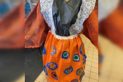 The 'Living Out Of Bags' dress is made from recycling leftover plastic from refugee camps.