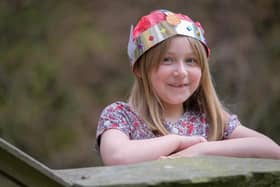 Seven-year-old Daisy Lewis wearing a Jubilee crown and you an make your own at free events