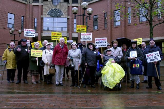 Protesters whose homes on the cliff-top at Flamborough were under threat over ground rents are pictured at Hull Crown Court in 2001. (TC Flambro2.jpg)
