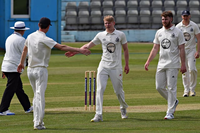 Teenager Hayden Williamson celebrates taking a wicket for Scarborough CC 2nds against Goole Town