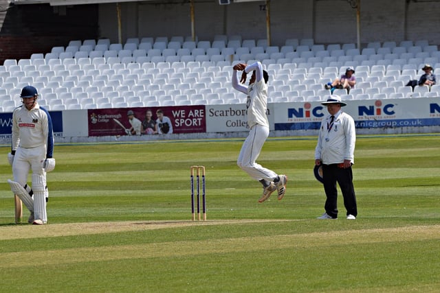 Joshua Branch bowling for the home side