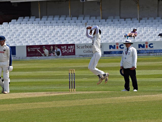 Joshua Branch bowling for the home side