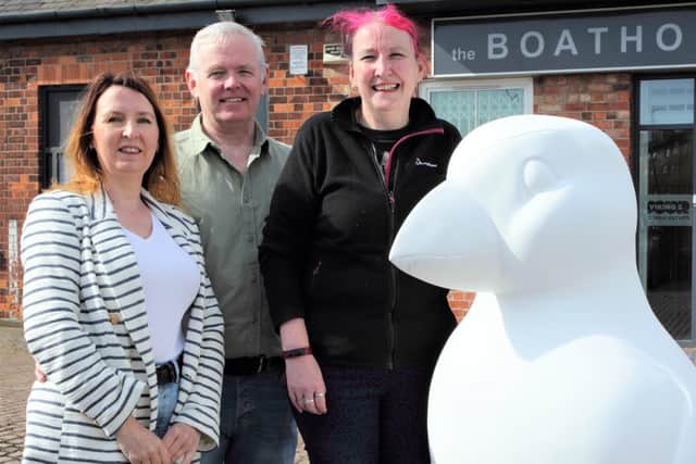 Rachel and James Murray with Clare Huby, a director of Puffins Galore Ltd, and one of the puffins. Photo by Paul Smith.