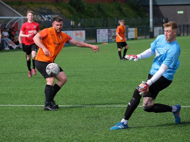 Edgehill take a shot at goal in the League Cup final