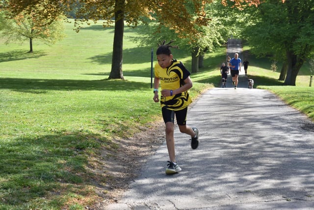 A young Bridlington Road Runner works hard in the Sewerby Parkrun on Saturday May 14 2022