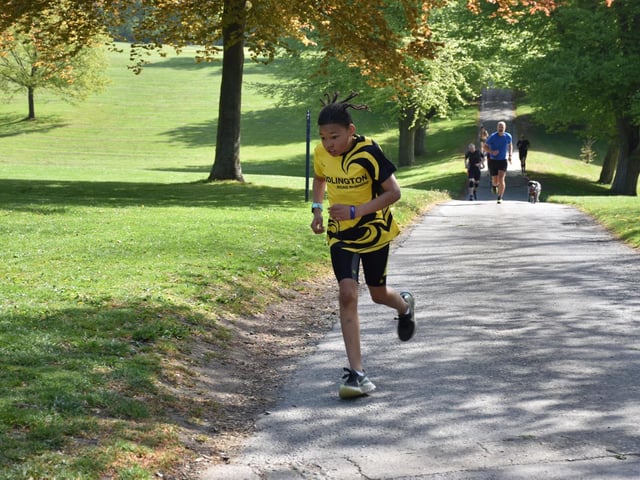 A young Bridlington Road Runner works hard in the Sewerby Parkrun on Saturday May 14 2022