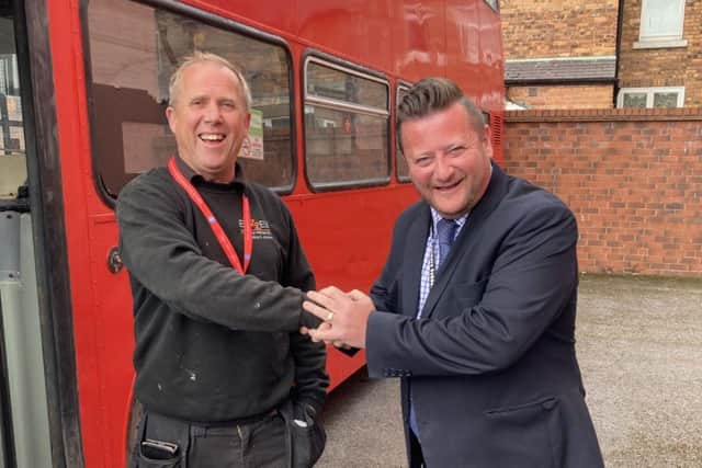 Frank Wright, Managing Director of Eazzee Building Maintenance Ltd, left, and Gladstone Road Primary School Headteacher Garry Johnson. (Photo: Gladstone Road Primary School)