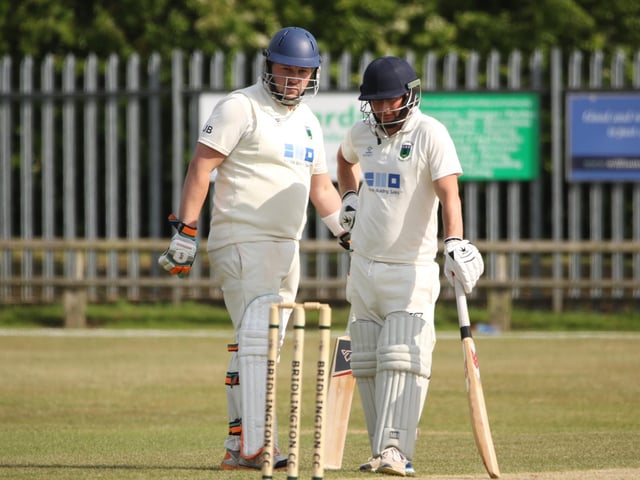 The Cottingham batsmen take a minute to assess the situation at Bridlington CC