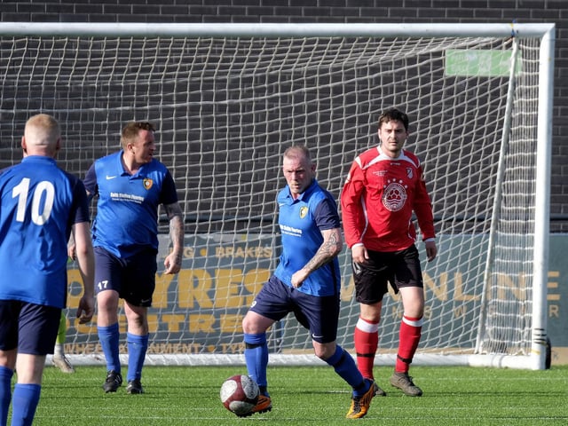 Former Scarborough Athletic midfielder Gary Hepples brings the ball forward for Edgehill Reserves v Filey Town Reserves in the Frank White Trophy final