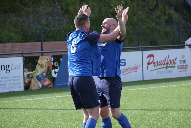 Edgehill Reserves players celebrate a goal in the final win