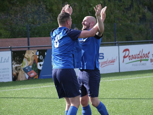 Edgehill Reserves players celebrate a goal in the final win