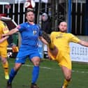 Midfielder Adam Gell, centre, has left Whitby Town