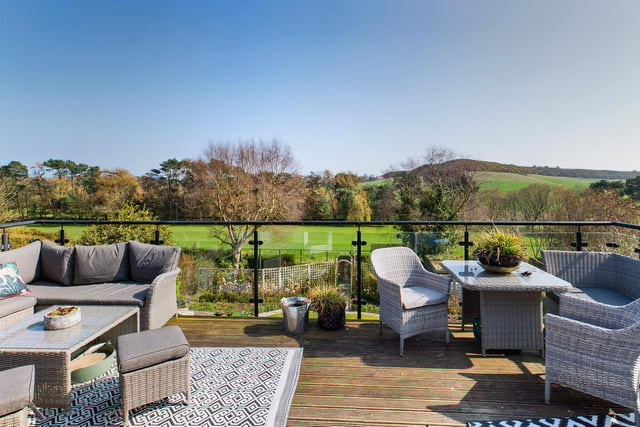Open countryside and the South Cliff Golf Course provide panoramic views from the property.