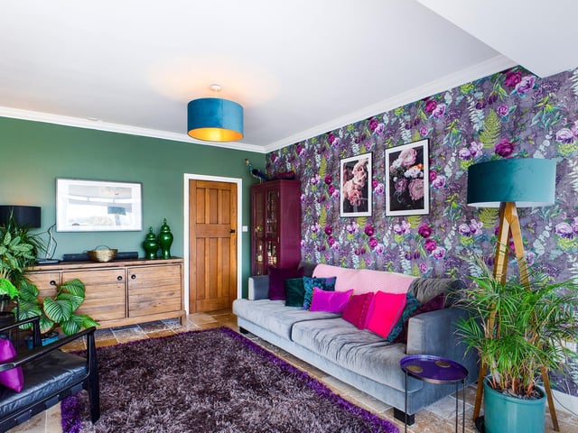 The stylish interior has a range of versatile rooms.