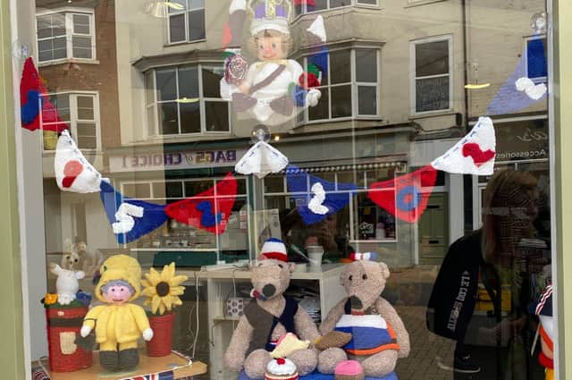 In Stitches, which is based on King Street, is showcasing knitted characters as a window display to celebrate the Queen's Platinum Jubilee. Photo submitted