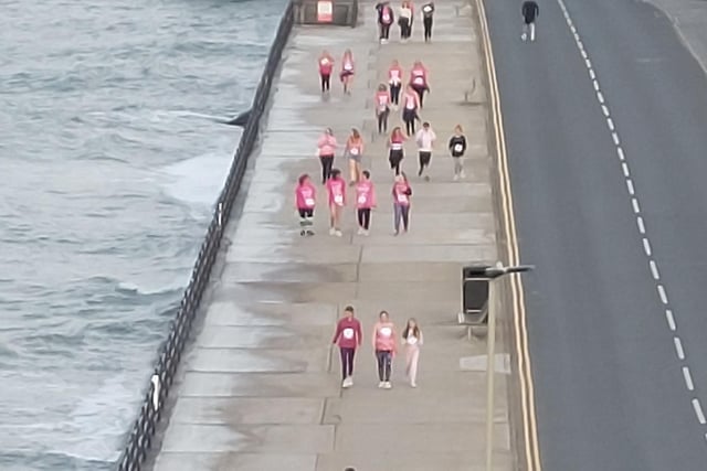 Competitors on the seafront.