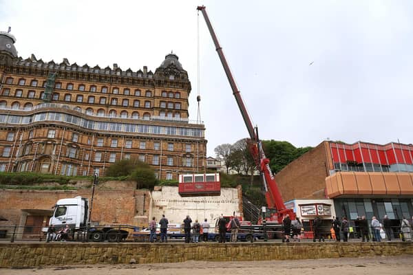 Central Tramway's carriages are returned to the seafront in the shadow of The Grand Hotel.