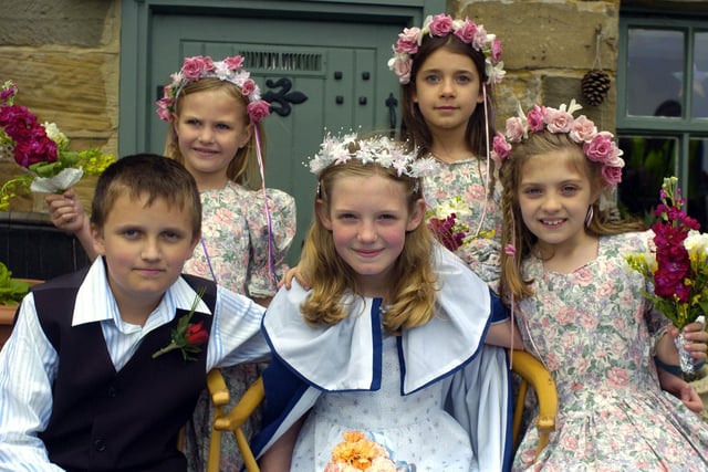 Children from Fylingthorpe Primary School take part in the May Queen parade at Robin Hood's Bay.