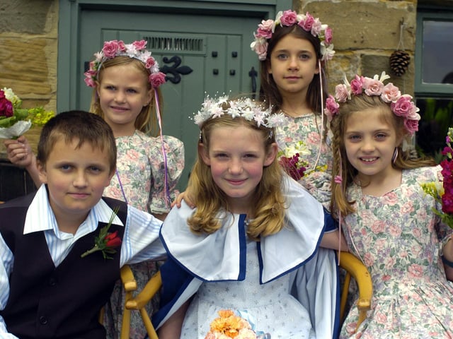 Children from Fylingthorpe Primary School take part in the May Queen parade at Robin Hood's Bay.