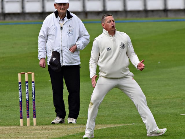 Adam Newington bowls for Scarborough