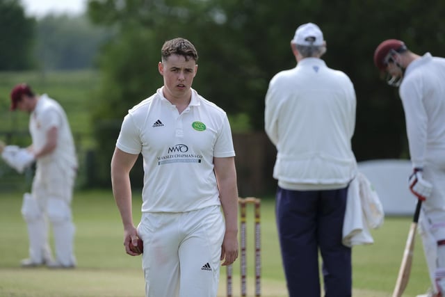 Mulgrave CC bowler Andy Raw walks back to his mark