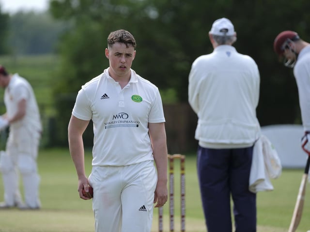 Mulgrave CC bowler Andy Raw walks back to his mark