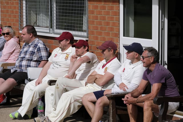 Staxton CC players and supporters watch the match against Mulgrave CC
