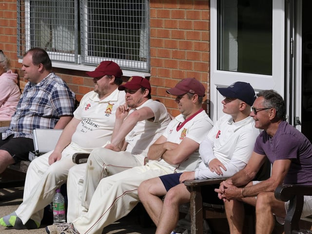 Staxton CC players and supporters watch the match against Mulgrave CC