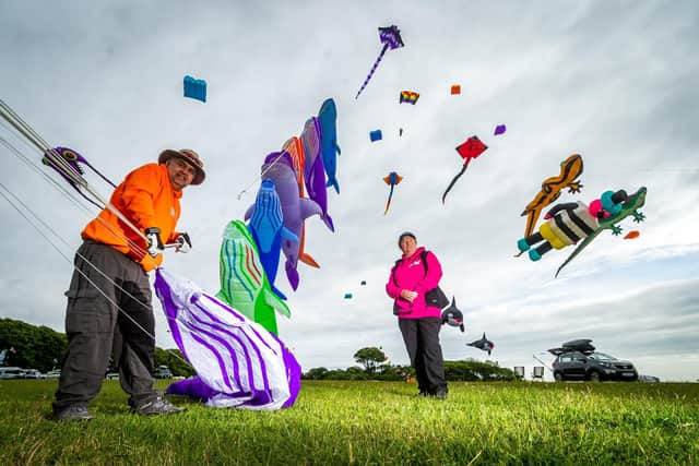 Andy and Anne De Sadeleer, from Filey, are pictured with their whale kites. Picture by James Hardisty