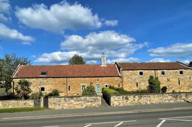 This £800,000 barn conversion has a great semi-rural location that is convenient for local amenities and for travel routes.