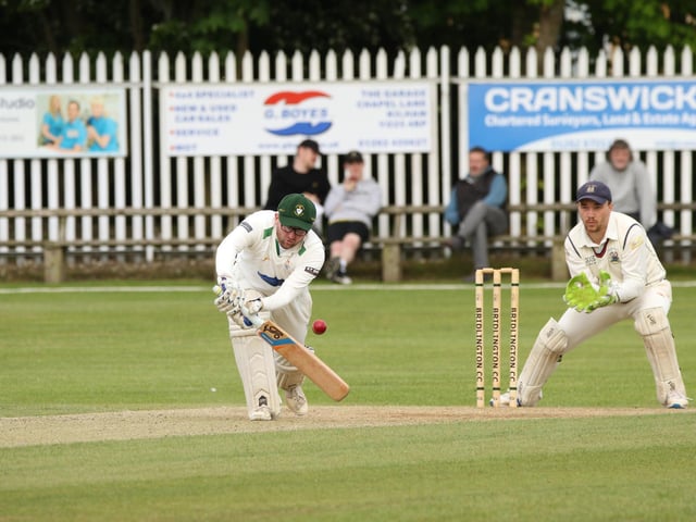 Bridlington CC 2nds batsman Sam Edmundson looks to keep out a Seamer & Irton CC delivery
