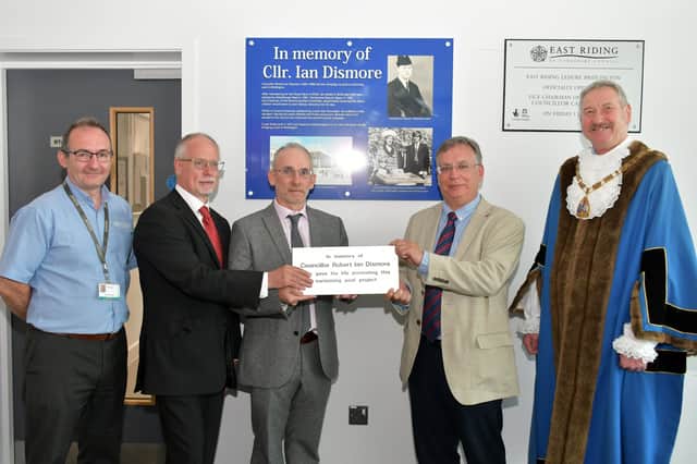 Adam Mainprize (leisure centre manager), Nigel Dismore, Julian Dismore, Andrew Dismore, and ERYC chairman John Whittle at the unveiling. Photo submitted