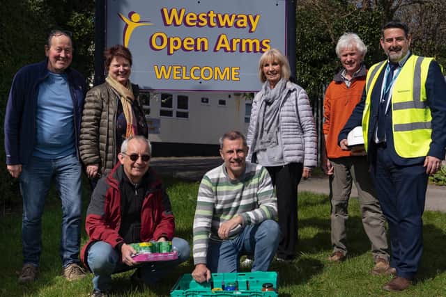 Westway Open Arms where the foodbank is located. L-R Paul Davies, Bernadette Brown, Geoff Borgham, Gordon Hayes, Jenny Wray and Graham White with Sanctuary's Tim Wray.