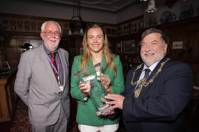 A civic reception for England Rugby star Zoe Aldcroft, pictured, Cllr Tony Randerson, left and Scarborough Mayor, Cilr Eric Broadbent, presenting Zoe with a gift

Photo by Richard Ponter