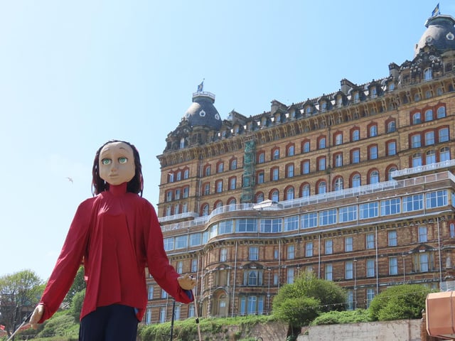 The 'Survivor' puppet in front of the Grand Hotel.